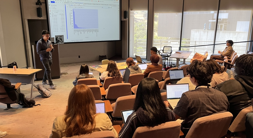 Participants listening to a presentation.